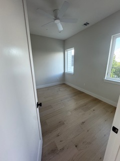 Bedroom with wood flooring Bedroom with wood flooring
