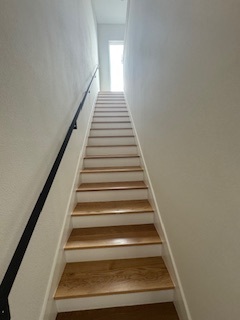 Interior staircase with wood treads Interior staircase with wood treads