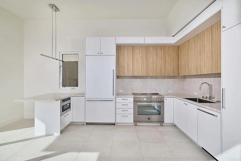 Kitchen with built-in stainless refrigerator Kitchen with built-in stainless refrigerator