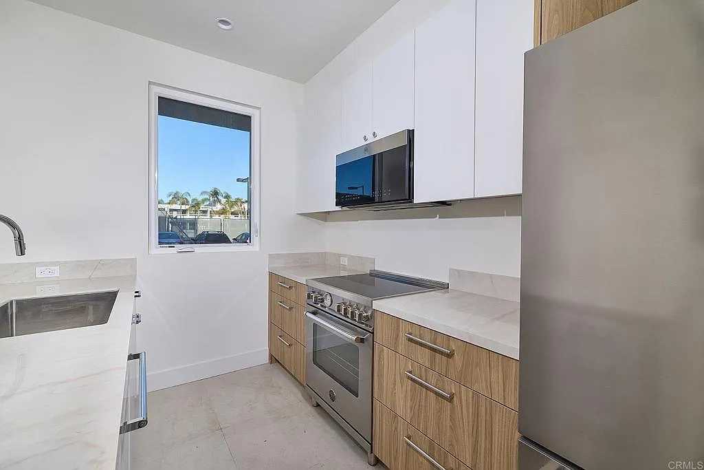 Compact kitchen with stainless appliances Compact kitchen with stainless appliances