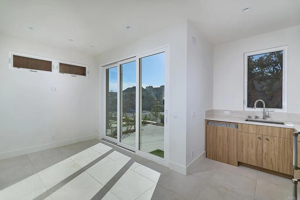 Room with wet bar opening to terrace Room with wet bar opening to terrace