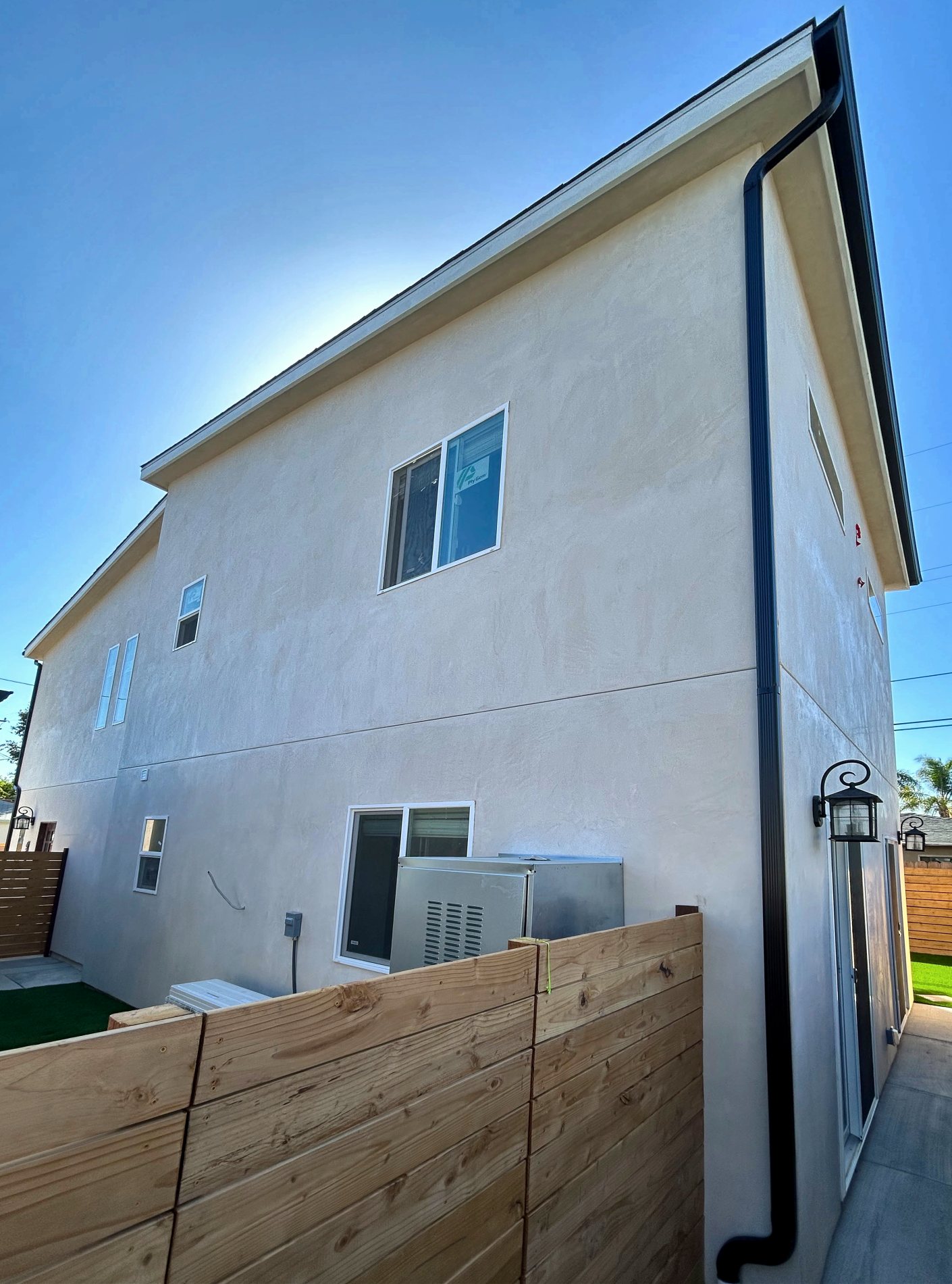 Completed two-story ADU building at 6209 Mesita Drive, San Diego Rear elevation of the completed two-story ADU building at 6209 Mesita Drive in San Diego's College Area